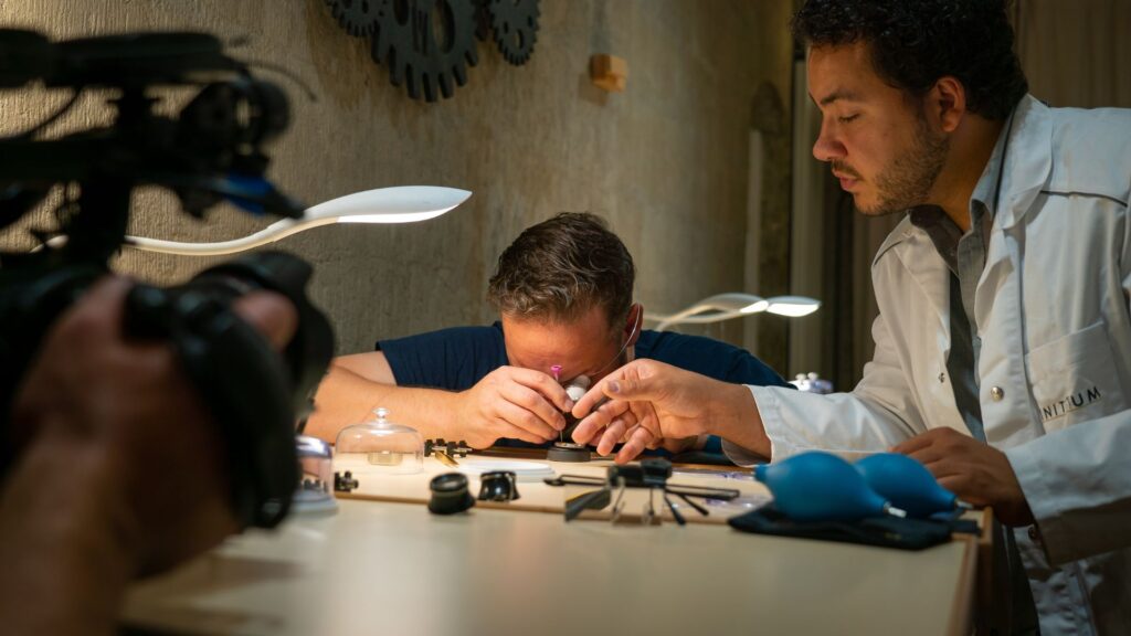 Jonathan Thompson and the Adventure Cities crew filming a watch making class in Geneva, Switzerland