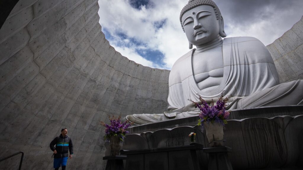 Jonathan Thompson filming at the Hill of the Buddha in Sapporo, Japan